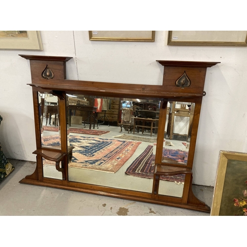 65 - Mirrors: Art Nouveau period mahogany framed overmantel mirror upper inset with stylised motifs. 82cm... 