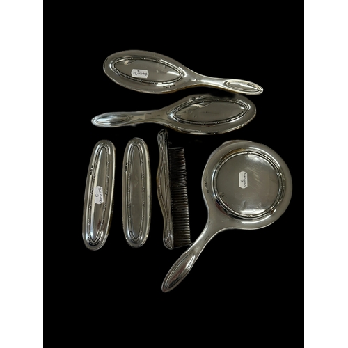 662 - Hallmarked Silver: Chester 1919 Jones & Revees dressing table set of hand mirror, hairbrushes x ... 