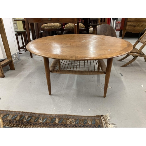 67 - Furniture: 20th cent. Danish teak Silaborn circular coffee table with rattan magazine rack.... 