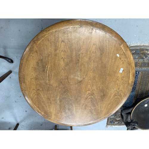 67 - Furniture: 20th cent. Danish teak Silaborn circular coffee table with rattan magazine rack.... 