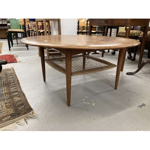 67 - Furniture: 20th cent. Danish teak Silaborn circular coffee table with rattan magazine rack.... 