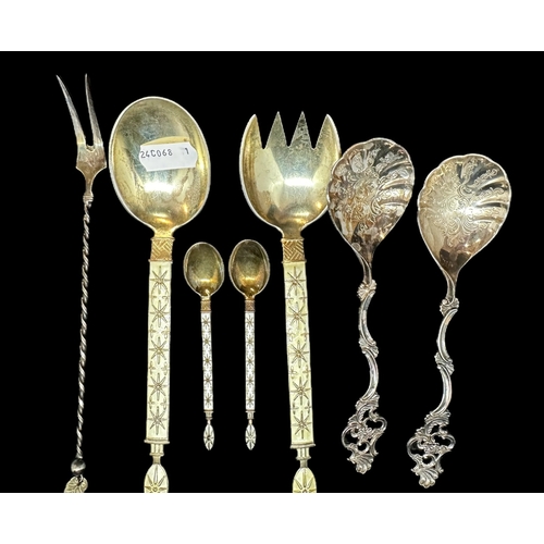 679 - Continental Silver: Norwegian silver gilt and enamel fork and spoon by J. Tostrup, together with a m... 