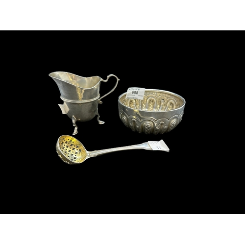 688 - Silver: Cream jug standing upon three hoofed feet, London 1886, plus a bowl decorated with wheat and... 