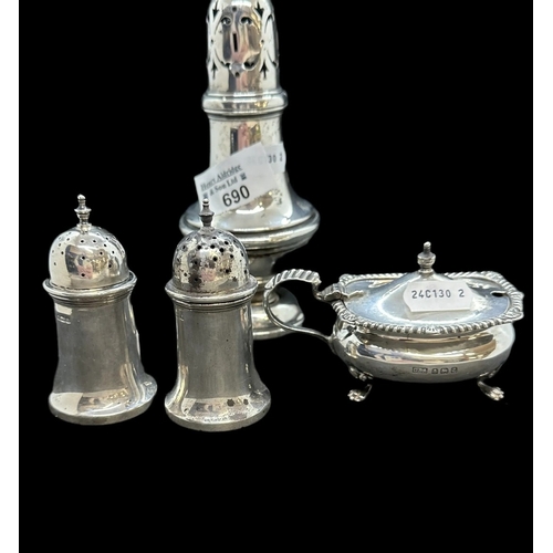 690 - Hallmarked Silver: Birmingham sugar shaker, pair of condiments and mustard pot with blue liner. 9oz.... 