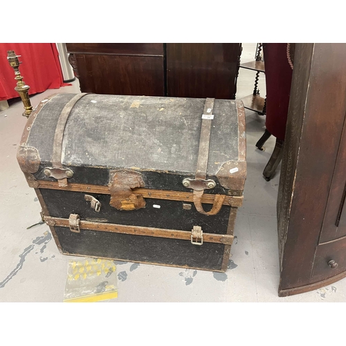 71 - Travel Trunk: Edwardian dome top canvas travelling trunk with leather handles, copper bound. 75cm lo... 