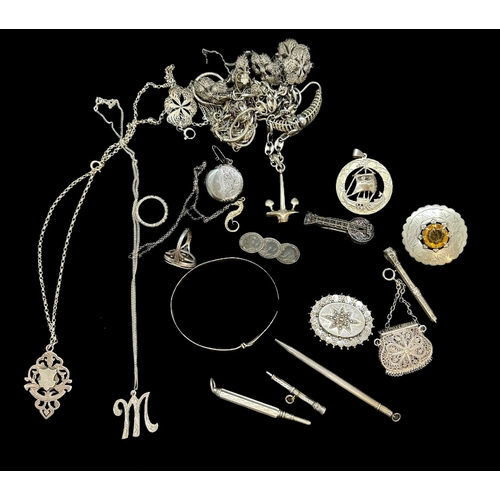 720a - Jewellery: Silver and white metal assorted jewellery including Victorian brooch, locket, silver penc... 