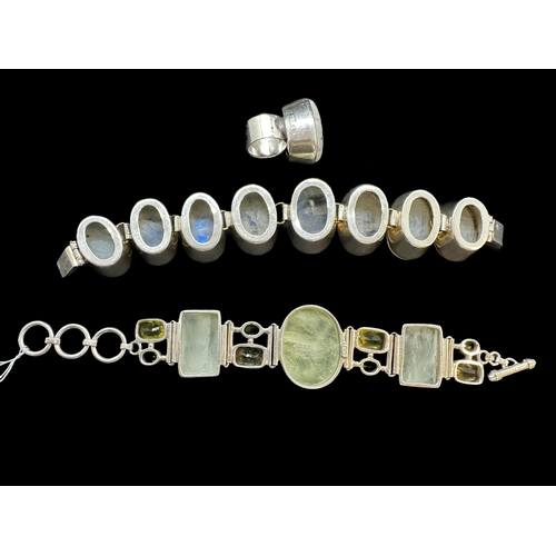 729 - Jewellery: Chunky white metal bracelet set with lemon quartz panels interspersed with citrines and p... 