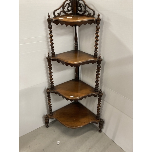 74 - Furniture: 19th cent. Mahogany corner what-not, four tiers, barley twist supports, serpentine fronts... 