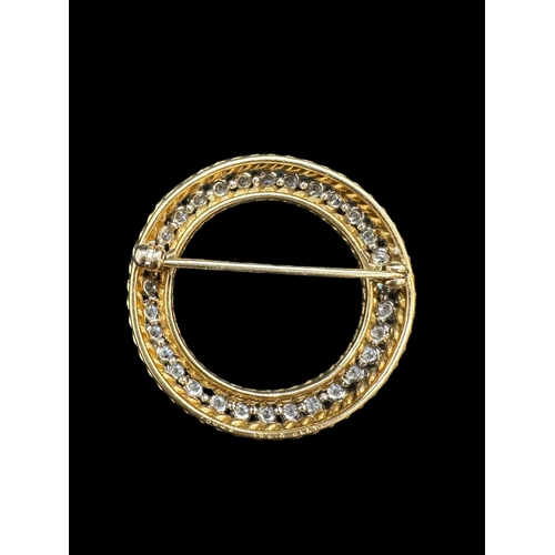 752 - Hallmarked Jewellery: 18ct. & platinum brooch of circular form, set with thirty round cut diamon... 