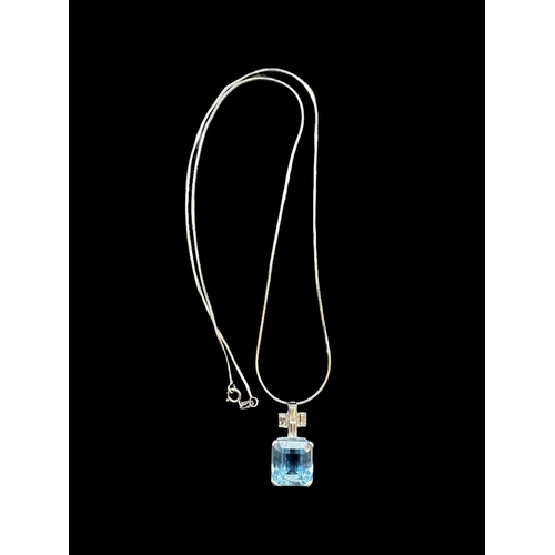 761 - Hallmarked Gold: 18ct white gold pendant set with four baguette-cut diamonds above an aquamarine. Gr... 