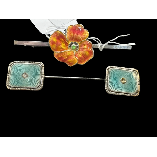 769 - Jewellery: Enamel tie or cravat pins one marked silver with enamel central poppy, the other a two-pa... 