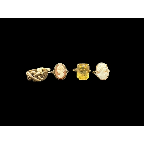 803 - Hallmarked Jewellery: Three 9ct gold rings, two set with cameos, the third a single citrine. Plus a ... 