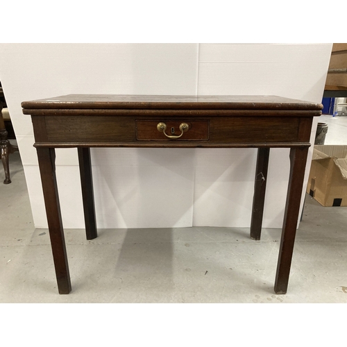 81 - Furniture: 19th cent. Mahogany tea table on chamfered supports. 17½ins. x 36ins.