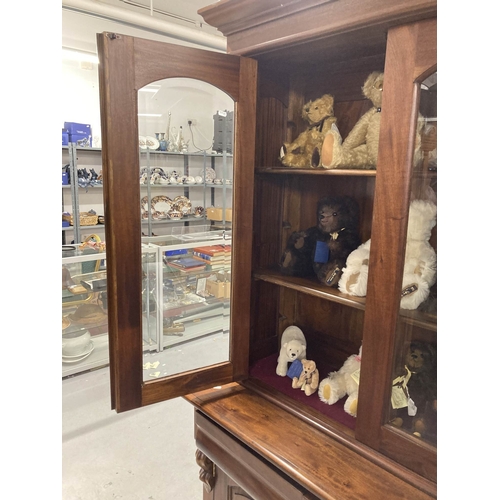 83 - Furniture: 20th cent. Mahogany bookcase with four glazed doors above a base with four drawers and cu... 