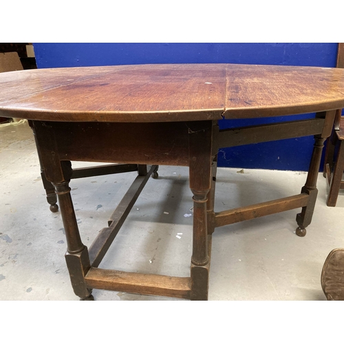 90 - Furniture: 18th cent. Oak gate leg table of good colour. 64ins. x 54½ins. Extended.