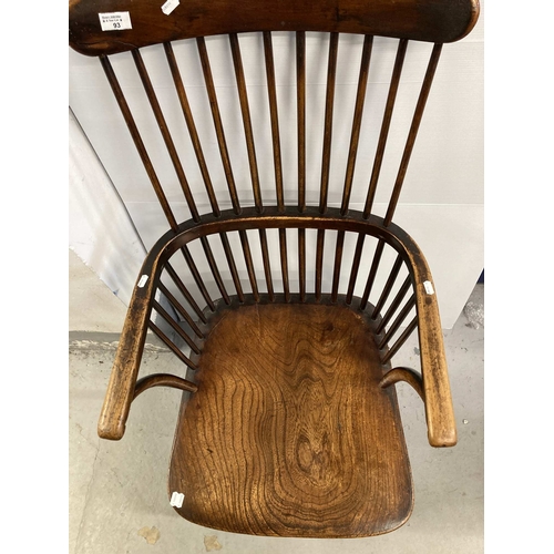 93 - Furniture: 18th cent. Elm comb back chair with H stretcher, turned supports and three-part arm, of g... 