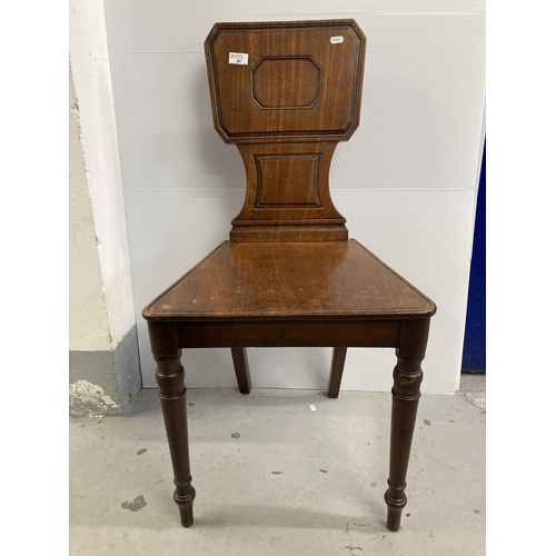 94 - Furniture: 19th cent. Oak hall chair with geometric back.