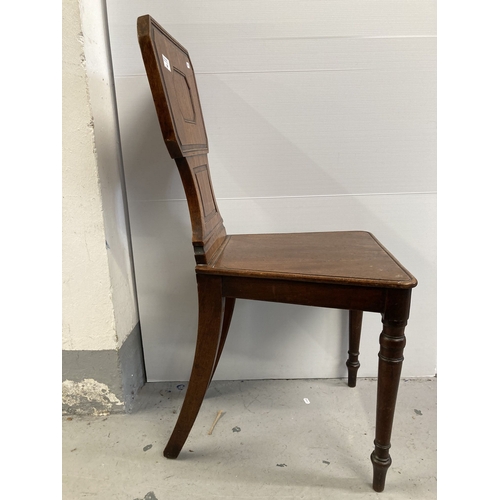 94 - Furniture: 19th cent. Oak hall chair with geometric back.