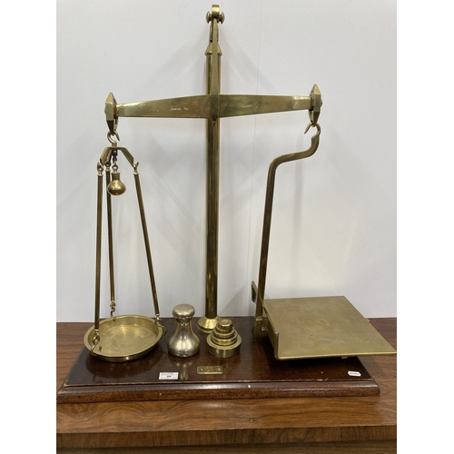 98 - Scientific Instruments: Scientific Instruments: Brass shop counter scales with weights, on mahogany ... 