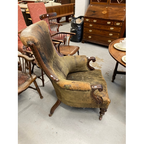 123 - Furniture: 18th cent. Mahogany framed library chair, leather upholstered, turned and carved front su... 