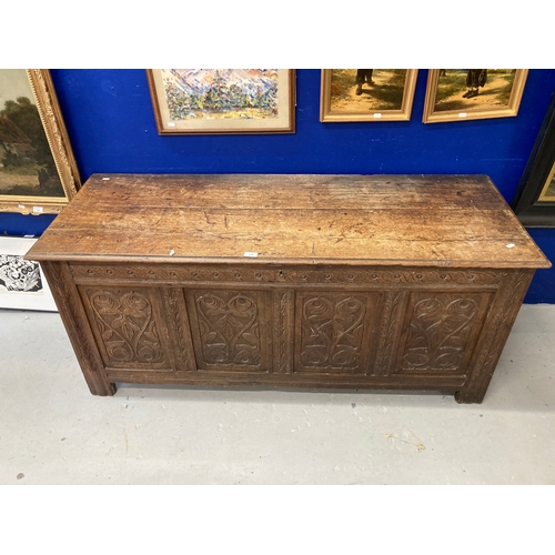 126 - Furniture: 19th cent. oak twelve-panel oak coffer with floral carved decoration. 5ft. x 26ins. x 22i... 