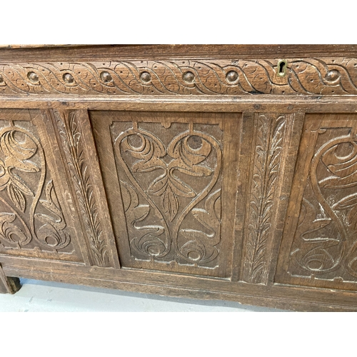 126 - Furniture: 19th cent. oak twelve-panel oak coffer with floral carved decoration. 5ft. x 26ins. x 22i... 