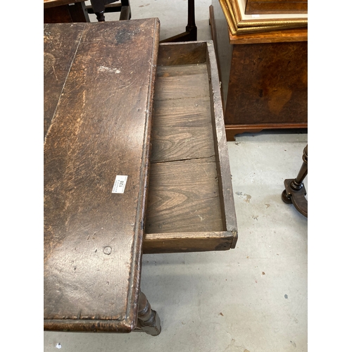 128 - 18th cent. Oak lowboy with single drawers and turned supports. 33ins. x 28ins. x 23ins.