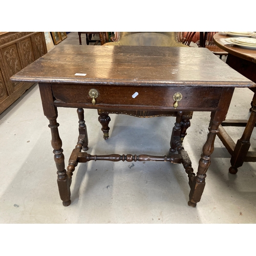 128 - 18th cent. Oak lowboy with single drawers and turned supports. 33ins. x 28ins. x 23ins.