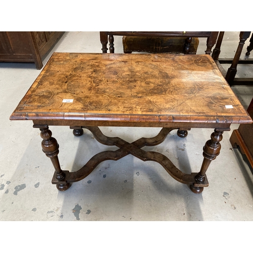 129 - William and Mary style oyster veneer coffee table on cross stretchers. 33ins. x 22ins. x 22ins.... 