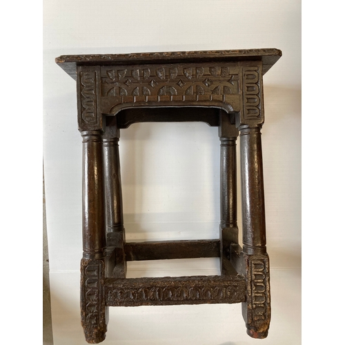 132 - Furniture: 17th/18th cent. oak joint stool with gun barrel supports and chip carving.