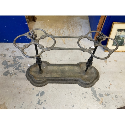 133 - 19th cent. Cast iron stick stand the top section with shaped and curved open sections the stands are... 