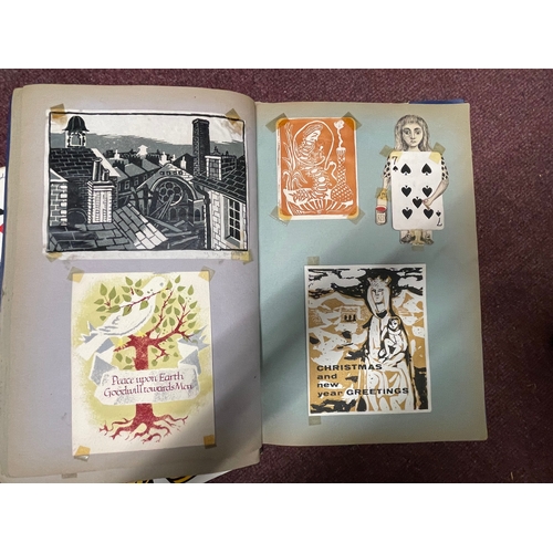 233 - Two albums of Christmas cards handmade by students of Goldsmiths Art College in the 1940s, 50s, 60s ... 