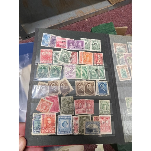 234 - Stamps: Two stock books and one album of mainly GB mint stamps including many unuse Elizabeth II blo... 