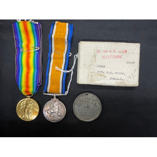 301 - Militaria: First World War medal pair of War and Victory given to Private RG Young of the Somerset L... 