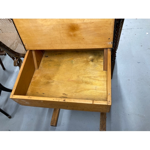 61 - Mid 20th cent. Oak school desk with lift-up lid, pen groove, brass inkwell and sliding cover.