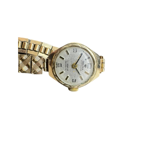 881 - Watches: Ladies 9ct. gold Delma wristwatch with incabloc movement and integral gold strap. Head meas... 