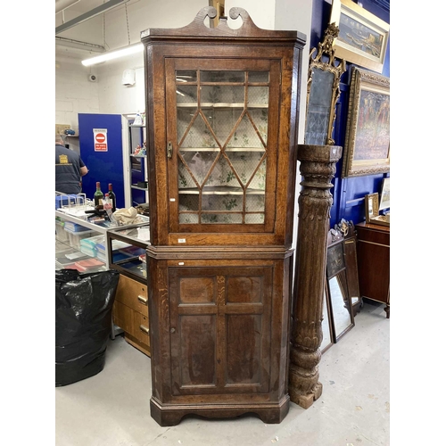 132 - Furniture: An oak Corner cupboard of two sections with astrogal glazed door to the top (1 Piece Miss... 