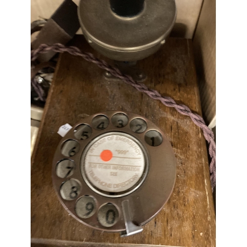 23 - Telephones: 1920s treen Bakelite and brass wall-mounted telephone, a pair of six-line phones and a B... 