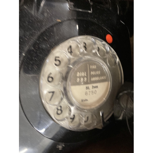 23 - Telephones: 1920s treen Bakelite and brass wall-mounted telephone, a pair of six-line phones and a B... 