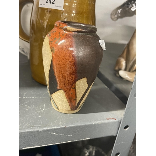 242 - Studio pottery glazed harvest jug with potter's mark AC in a square plus a small stoneware vase with... 