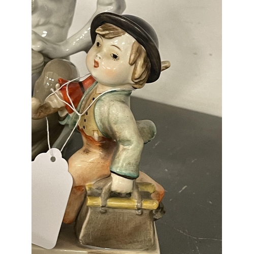 245 - Ceramics: Hummel figurine, 'The HappyWanderer', in unusual colourway with early crown mark, 1935-194... 