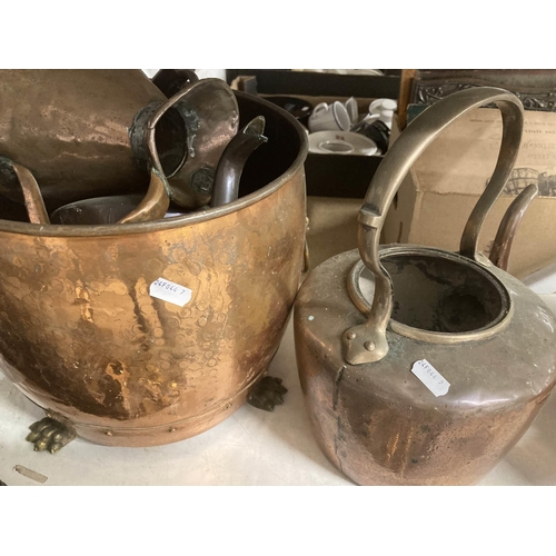 31 - Metalware: 19th cent. Large group of copper domestic wares including kettles, jugs, saucepans, ladle... 