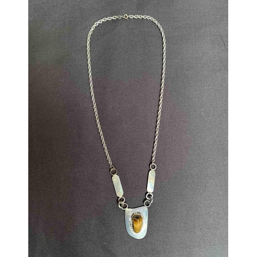 375 - Elvis Presley: Extremely Rare Elvis Owned and worn Sterling Silver Tigers Eye Necklace, sold with an... 