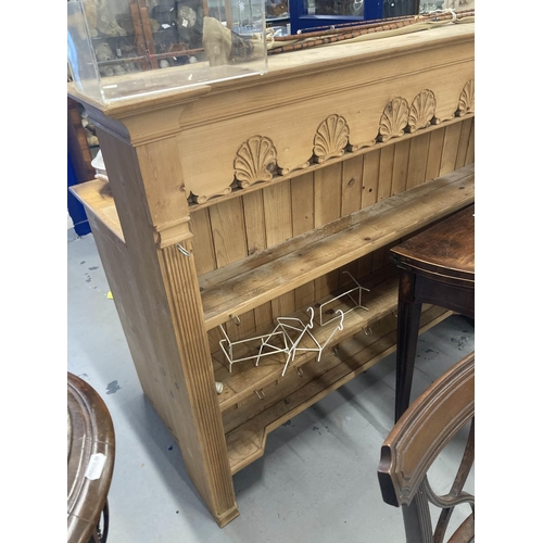 55 - 20th cent. Pine dresser and rack the base three drawers over a twin door cupboard topped by a three ... 