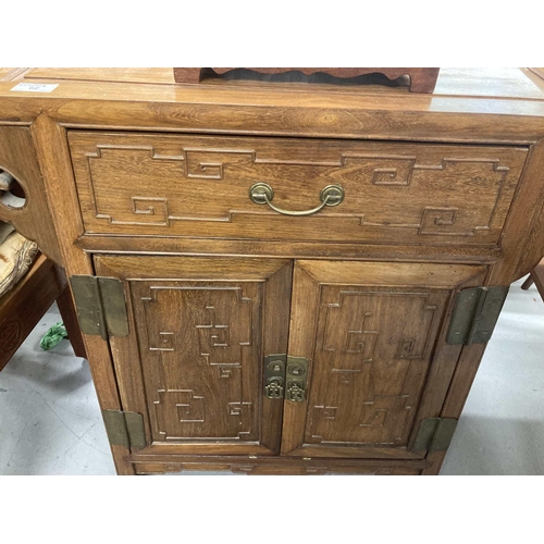 62 - Chinese: Hardwood cabinet with panel top on scroll ends. 76cm x 82cm.