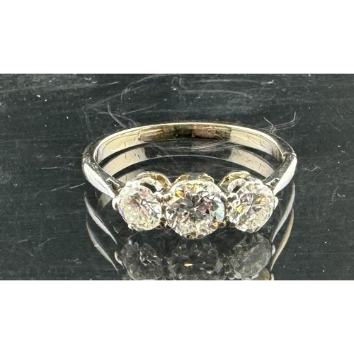817 - Jewellery: White metal ring claw set with three brilliant cut diamonds, estimated weight of (3) 1.00... 