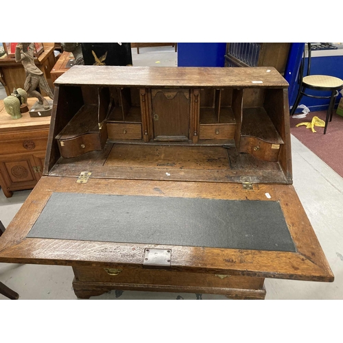 85 - Late 18th/early 19th Century oak bureau with well, secret drawers two short over three long on shape... 