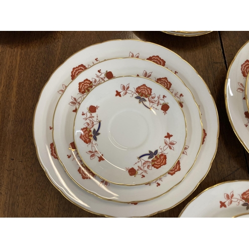 92 - Ceramics: Royal Crown Derby Bali pattern dinner service. (Approx. 74 pieces)