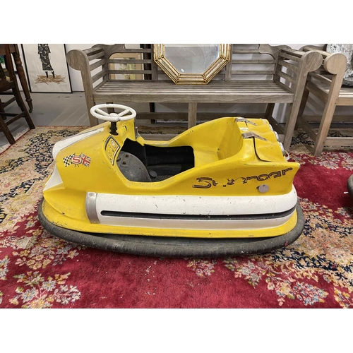 104 - Toys: Toys: A late 1960s child's battery-operated glass fibre bumper car. 360-degree rotating chain-... 