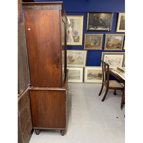 113 - Furniture: Furniture: George III mahogany linen press cupboard. The top has flame curl figuring pane... 